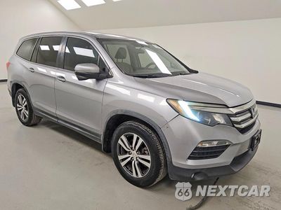 Czwarte zdjęcie samochodu z boku: 2016 HONDA PILOT EX VIN:5FNYF5H33GB018677 - miniatura