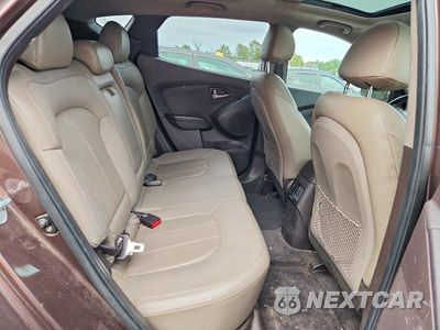Zdjęcie 11 z 13 samochodu: 2014 HYUNDAI TUCSON LIMITED VIN:KM8JUCAG9EU844121 - miniatura
