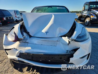 Piąte zdjęcie samochodu w środku: 2023 TESLA MODEL Y VIN:7SAYGDEF2PA049456 - miniatura