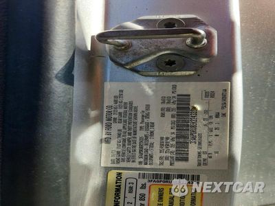 Zdjęcie 12 z 12 samochodu: 2014 FORD FUSION TITANIUM HEV VIN:3FA6P0RU8ER224335 - miniatura