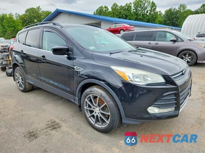 Czwarte zdjęcie samochodu z boku: 2016 FORD ESCAPE SE VIN:1FMCU9G99GUC31956 - miniatura