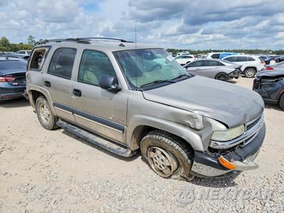 Czwarte zdjęcie samochodu z boku: 2003 CHEVROLET TAHOE C1500 VIN:1GNEC13V23R309177 - miniatura