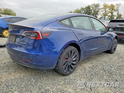 Trzecie zdjęcie samochodu z tyłu: 2022 TESLA MODEL 3 VIN:5YJ3E1EC9NF261529 - miniatura