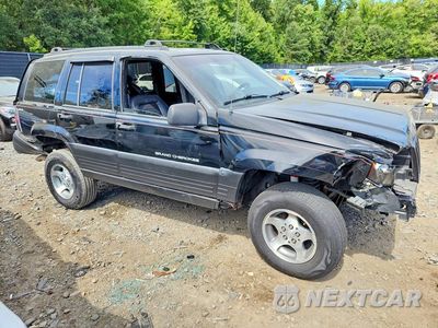 Czwarte zdjęcie samochodu z boku: 1997 JEEP GRAND CHEROKEE LAREDO VIN:1J4GZ58S9VC503288 - miniatura