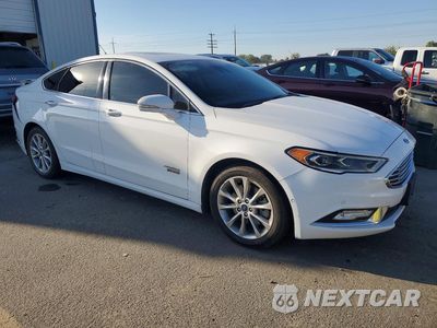 Czwarte zdjęcie samochodu z boku: 2017 FORD FUSION TITANIUM PHEV VIN:3FA6P0SUXHR152276 - miniatura