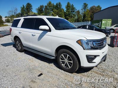 Czwarte zdjęcie samochodu z boku: 2021 FORD EXPEDITION XLT VIN:1FMJU1HT3MEA75535 - miniatura