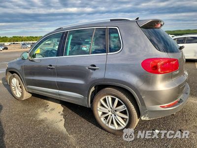 Drugie zdjęcie samochodu z przodu: 2014 VOLKSWAGEN TIGUAN S VIN:WVGBV3AXXEW548336 - miniatura