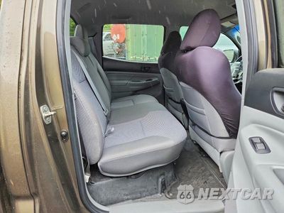 Zdjęcie 10 z 12 samochodu: 2013 TOYOTA TACOMA V6 VIN:3TMLU4EN1DM116467 - miniatura