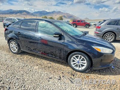 Czwarte zdjęcie samochodu z boku: 2017 FORD FOCUS SE VIN:1FADP3F2XHL217708 - miniatura