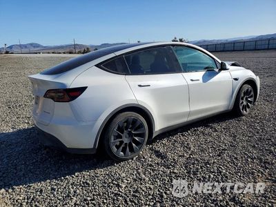 Trzecie zdjęcie samochodu z tyłu: 2023 TESLA MODEL Y VIN:7SAYGAEE3PF745641 - miniatura