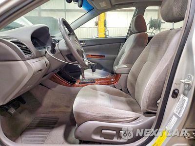 Zdjęcie 7 z 13 samochodu: 2003 TOYOTA CAMRY XLE VIN:4T1BE30KX3U152308 - miniatura
