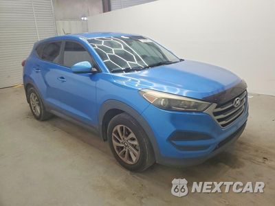 Czwarte zdjęcie samochodu z boku: 2017 HYUNDAI TUCSON SE VIN:KM8J23A46HU545850 - miniatura