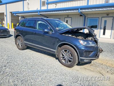 Czwarte zdjęcie samochodu z boku: 2016 VOLKSWAGEN TOUAREG TDI VIN:WVGEP9BP7GD000706 - miniatura