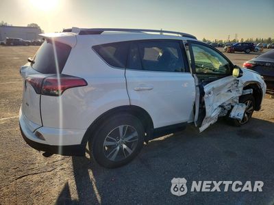 Trzecie zdjęcie samochodu z tyłu: 2017 TOYOTA RAV4 XLE VIN:JTMWFREV0HJ704674 - miniatura