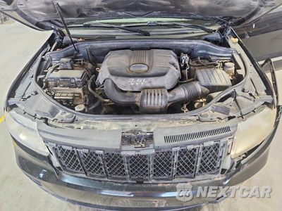 Zdjęcie 12 z 13 samochodu: 2013 JEEP GRAND CHEROKEE OVERLAND VIN:1C4RJFCG6DC581475 - miniatura