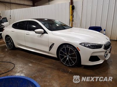Czwarte zdjęcie samochodu z boku: 2022 BMW 840XI VIN:WBAGV4C00NCJ59557 - miniatura