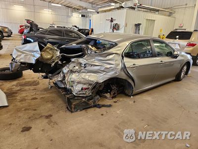 Trzecie zdjęcie samochodu z tyłu: 2022 TOYOTA CAMRY LE VIN:4T1C31AK6NU590582 - miniatura