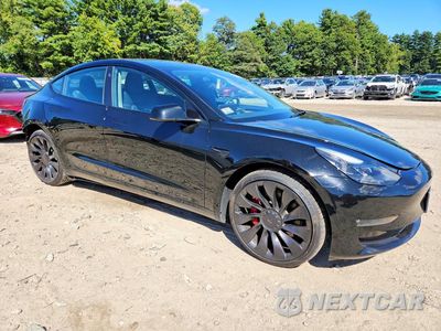 Czwarte zdjęcie samochodu z boku: 2023 TESLA MODEL 3 VIN:5YJ3E1EC3PF680382 - miniatura
