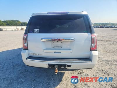 Zdjęcie 6 z 13 samochodu: 2016 GMC YUKON XL DENALI VIN:1GKS2HKJ8GR354883 - miniatura