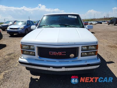 Piąte zdjęcie samochodu w środku: 1998 GMC SIERRA C1500 VIN:1GTEC14R2WZ518692 - miniatura