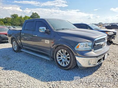 Czwarte zdjęcie samochodu z boku: 2014 RAM 1500 LONGHORN VIN:1C6RR7PM6ES337063 - miniatura