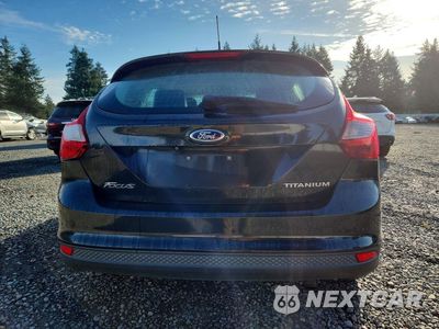 Zdjęcie 6 z 13 samochodu: 2014 FORD FOCUS TITANIUM VIN:1FADP3N26EL111317 - miniatura