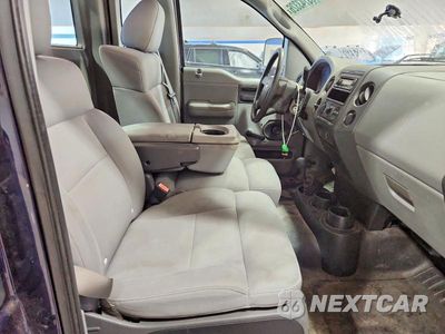 Zdjęcie 10 z 12 samochodu: 2004 FORD F150 VIN:1FTVF14554NB81167 - miniatura