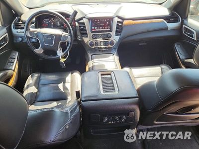 Zdjęcie 8 z 13 samochodu: 2016 GMC YUKON DENALI VIN:1GKS2CKJ4GR460900 - miniatura