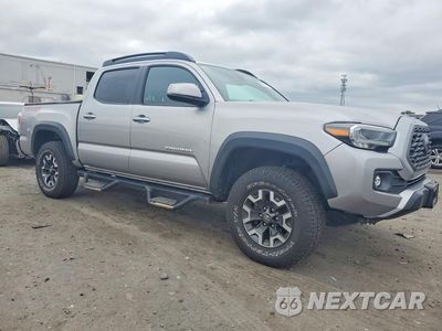 Czwarte zdjęcie samochodu z boku: 2021 TOYOTA TACOMA TRD OFF-ROAD VIN:3TYCZ5AN1MT037561 - miniatura