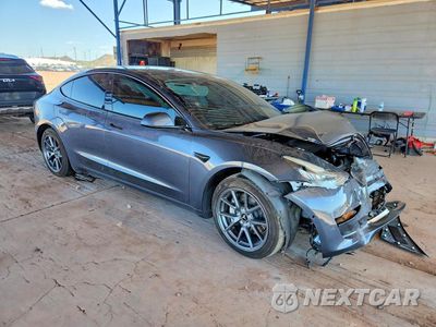 Czwarte zdjęcie samochodu z boku: 2022 TESLA MODEL 3 VIN:5YJ3E1EB2NF260973 - miniatura