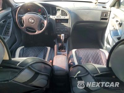 Zdjęcie 8 z 12 samochodu: 2004 HYUNDAI ELANTRA GT VIN:KMHDN56D14U107241 - miniatura