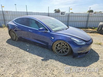Czwarte zdjęcie samochodu z boku: 2020 TESLA MODEL 3 VIN:5YJ3E1EB5LF640631 - miniatura