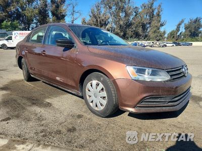 Czwarte zdjęcie samochodu z boku: 2016 VOLKSWAGEN JETTA S VIN:3VW267AJ3GM406835 - miniatura