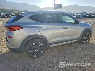 Trzecie zdjęcie samochodu z tyłu: 2020 HYUNDAI TUCSON SPORT VIN:KM8J33AL0LU119763 - miniatura