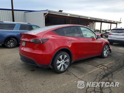 Trzecie zdjęcie samochodu z tyłu: 2022 TESLA MODEL Y VIN:7SAYGDEE7NF425379 - miniatura