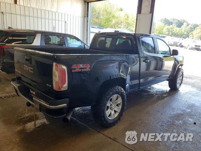 Trzecie zdjęcie samochodu z tyłu: 2016 GMC CANYON SLE VIN:1GTP6CE12G1274191 - miniatura