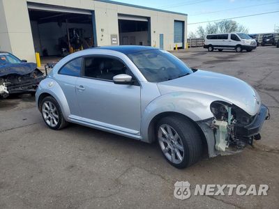 Czwarte zdjęcie samochodu z boku: 2014 VOLKSWAGEN BEETLE VIN:3VWJP7AT7EM605846 - miniatura