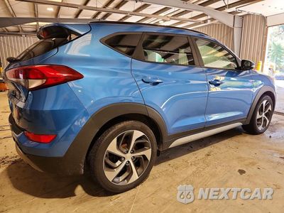 Trzecie zdjęcie samochodu z tyłu: 2018 HYUNDAI TUCSON VALUE VIN:KM8J33A25JU704102 - miniatura
