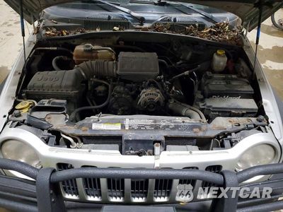 Zdjęcie 12 z 13 samochodu: 2003 JEEP LIBERTY SPORT VIN:1J4GL48K73W722225 - miniatura
