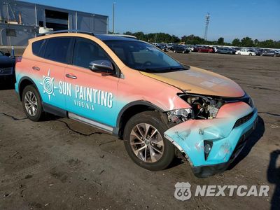 Czwarte zdjęcie samochodu z boku: 2017 TOYOTA RAV4 HYBRID XLE VIN:JTMRJREV0HD111570 - miniatura