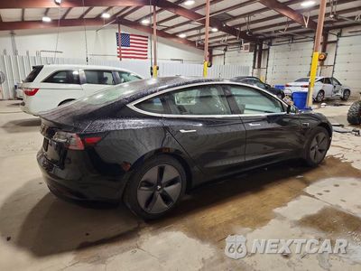 Trzecie zdjęcie samochodu z tyłu: 2019 TESLA MODEL 3 VIN:5YJ3E1EA3KF321606 - miniatura