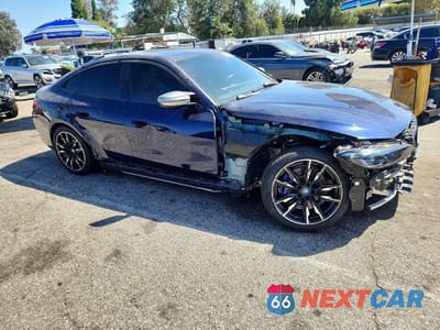 Czwarte zdjęcie samochodu z boku: 2022 BMW I4 M50 VIN:WBY33AW02NFM62368 - miniatura
