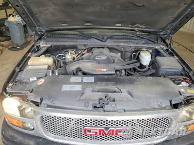 Zdjęcie 12 z 13 samochodu: 2004 GMC YUKON DENALI VIN:1GKEK63U04J135257 - miniatura