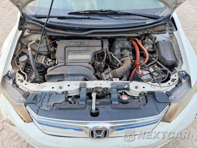 Zdjęcie 11 z 12 samochodu: 2012 HONDA CIVIC HYB 4D L VIN:JHMFB4F31CS007298 - miniatura