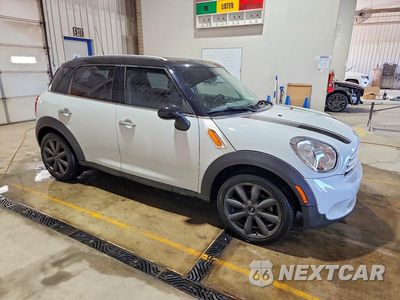 Czwarte zdjęcie samochodu z boku: 2014 MINI COOPER COUNTRYMAN VIN:WMWZB3C52EWR37976 - miniatura