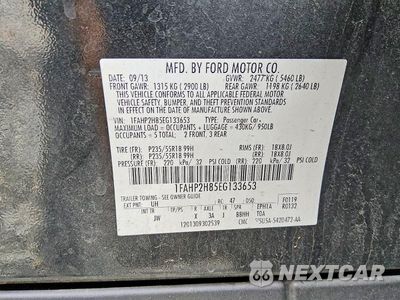 Zdjęcie 12 z 12 samochodu: 2014 FORD TAURUS SEL VIN:1FAHP2H85EG133653 - miniatura