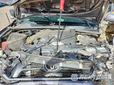 Zdjęcie 11 z 12 samochodu: 2014 TOYOTA TACOMA V6 VIN:3TMLU4EN1EM147722 - miniatura