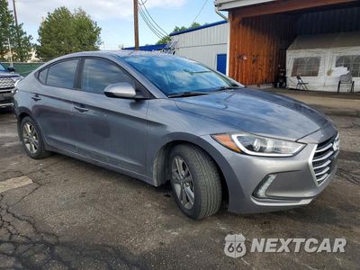 Czwarte zdjęcie samochodu z boku: 2018 HYUNDAI ELANTRA VALUE EDITION VIN:5NPD84LF3JH377198 - miniatura