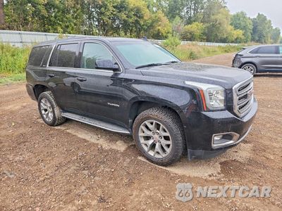Czwarte zdjęcie samochodu z boku: 2019 GMC YUKON SLE VIN:1GKS2AKC5KR387809 - miniatura