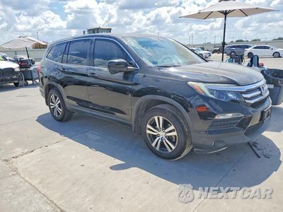 Czwarte zdjęcie samochodu z boku: 2017 HONDA PILOT EXL VIN:5FNYF5H5XHB040825 - miniatura